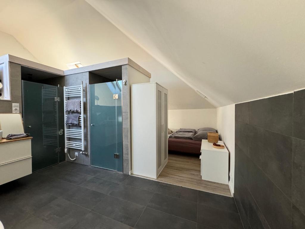 A bed or beds in a room at ZiMo Taliándörögdi MoZiHáz