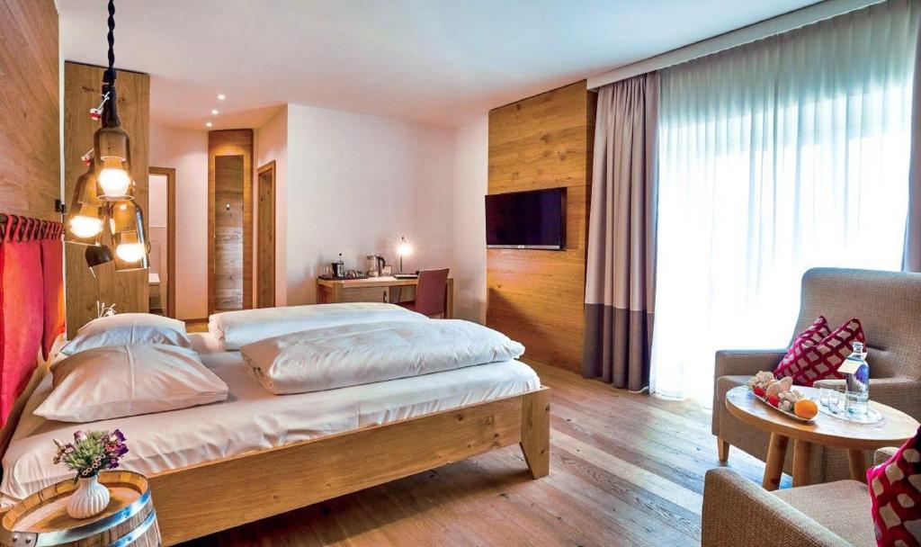 Postel nebo postele na pokoji v ubytování Landgasthof Kammbräu