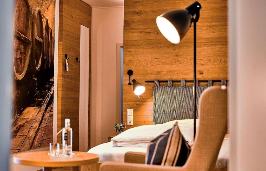 Postel nebo postele na pokoji v ubytování Landgasthof Kammbräu