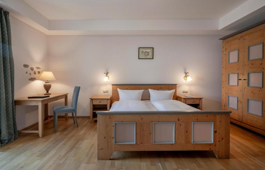 Postel nebo postele na pokoji v ubytování Landgasthof Kammbräu