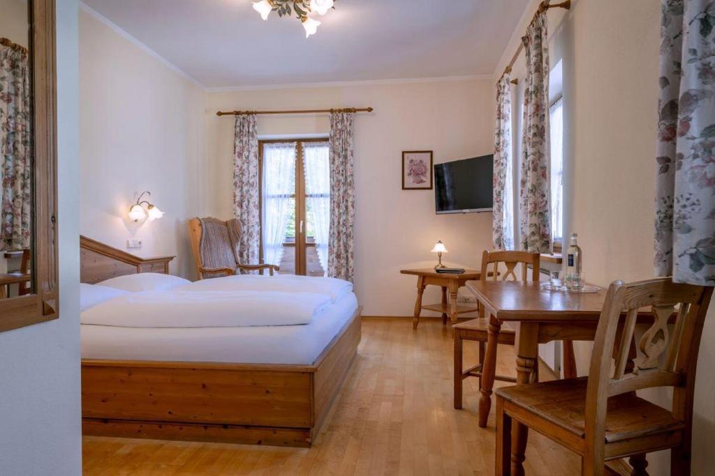 Postel nebo postele na pokoji v ubytování Landgasthof Kammbräu