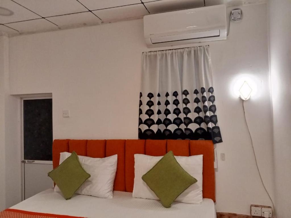 Postel nebo postele na pokoji v ubytování Muru's Place