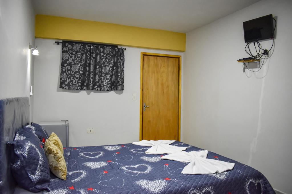 Postel nebo postele na pokoji v ubytování Ullanka Apart Hotel