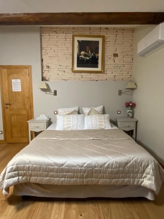 Postel nebo postele na pokoji v ubytování Le Clos du Cèdre