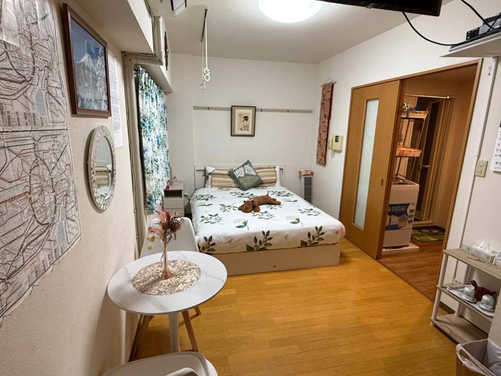 Postel nebo postele na pokoji v ubytování 都心の家30 square meter double bed room free for children201
