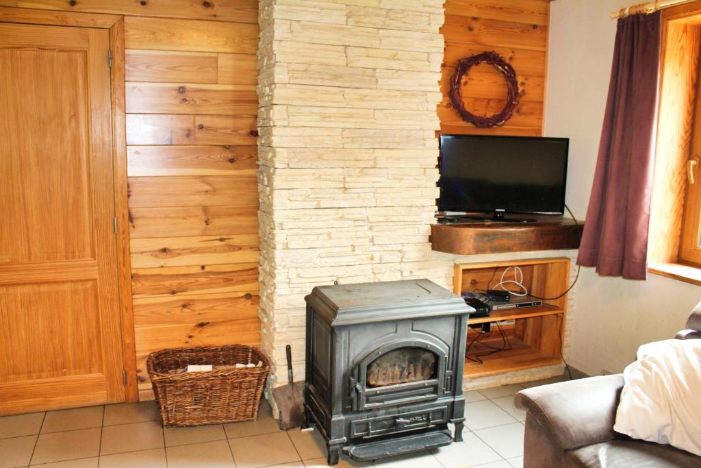 TV a/nebo společenská místnost v ubytování Eduard - Gîte Ardennais