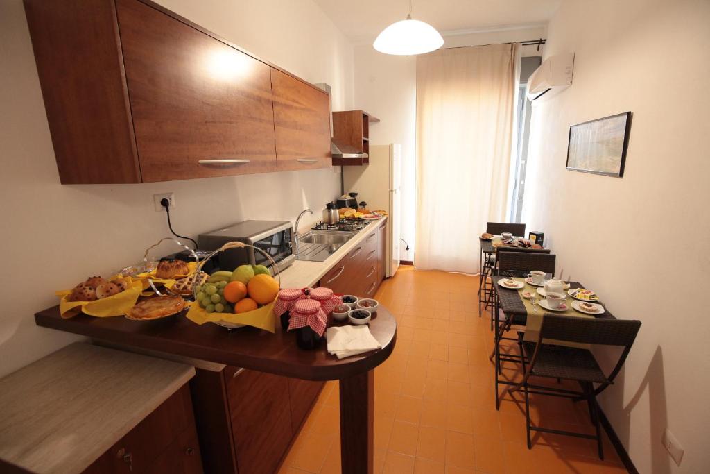 Kuchyň nebo kuchyňský kout v ubytování B&B Tarì