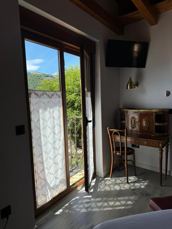 Postel nebo postele na pokoji v ubytování El hotel de Verdiago