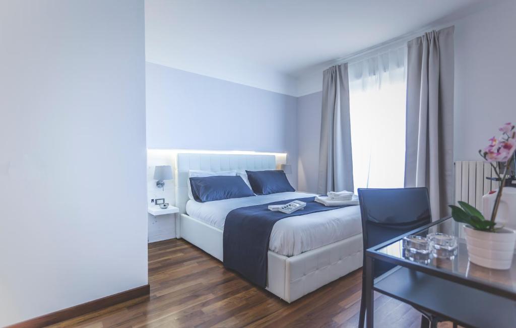 Postel nebo postele na pokoji v ubytování B&B Le 3 Stelle
