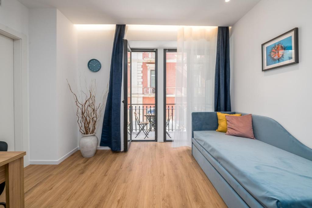 Ένα ή περισσότερα κρεβάτια σε δωμάτιο στο Ermes Suites & Rooms Bari