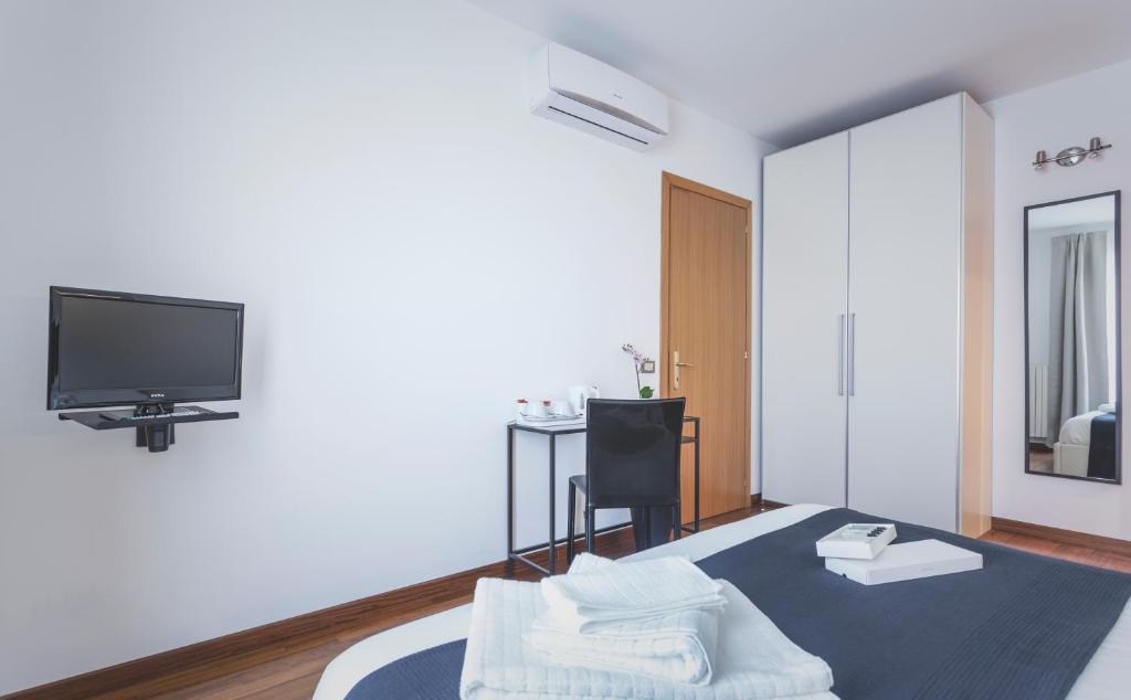 TV a/nebo společenská místnost v ubytování B&B Le 3 Stelle