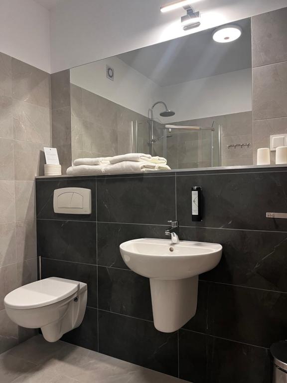 Koupelna v ubytování Hotel Uniwersytecki