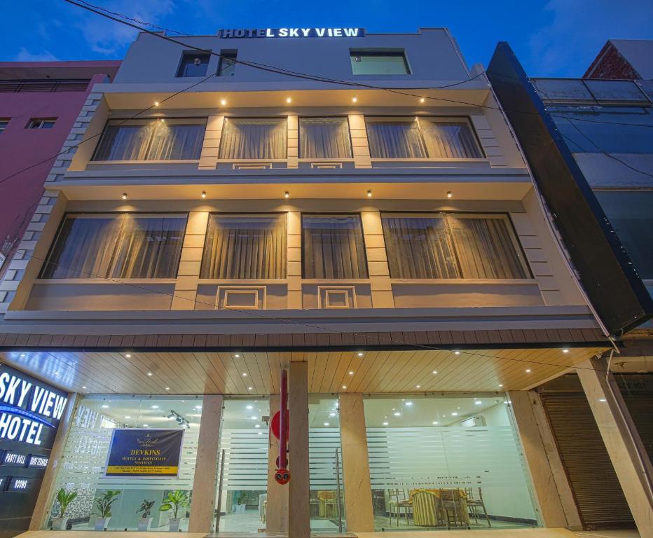 a large building with a store front with windows at HOTEL SKY VIEW - Zirakpur, Chandigarh in Zirakpur