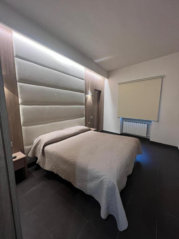 Postel nebo postele na pokoji v ubytování Hotel Ristorante Borgo Antico