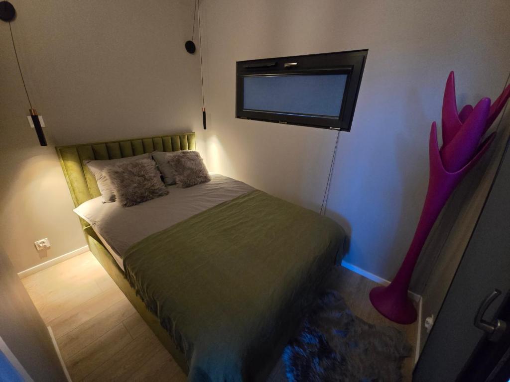 Postel nebo postele na pokoji v ubytování Happy Jura