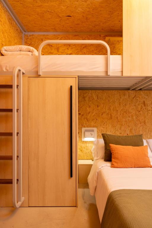 Postel nebo postele na pokoji v ubytování The Loft House Madrid