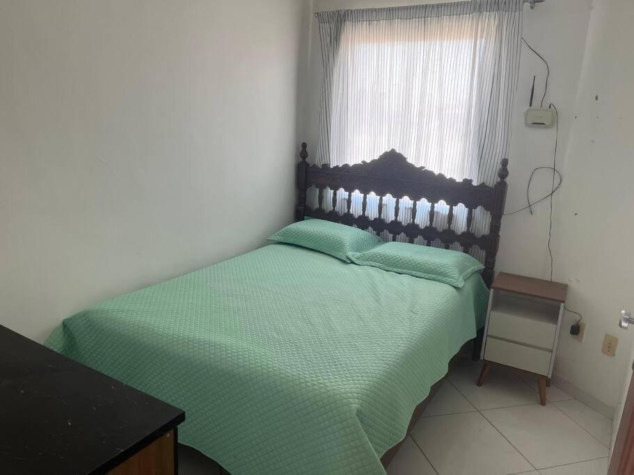 Voodi või voodid majutusasutuse Apt com varanda no centro toas