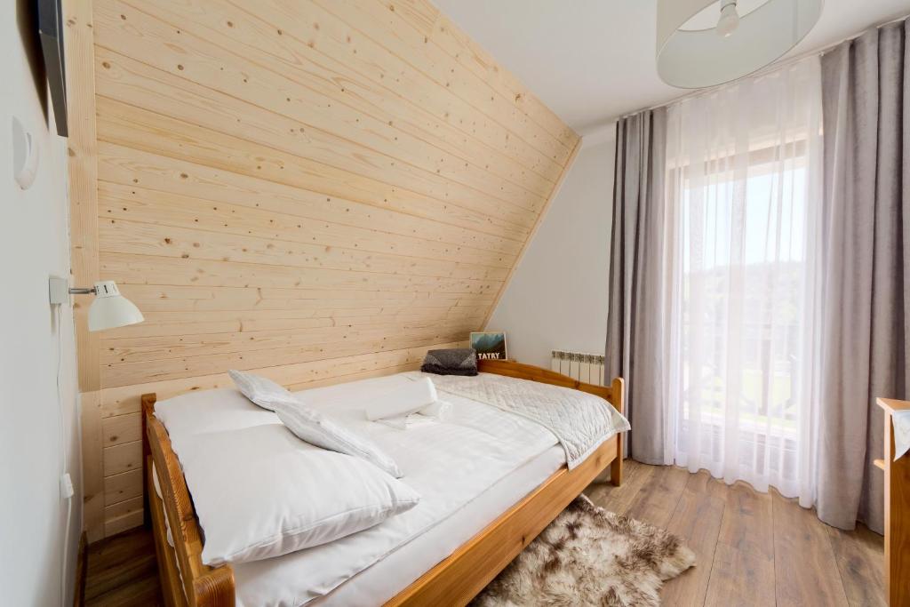 Postel nebo postele na pokoji v ubytování Willa Górski Potok