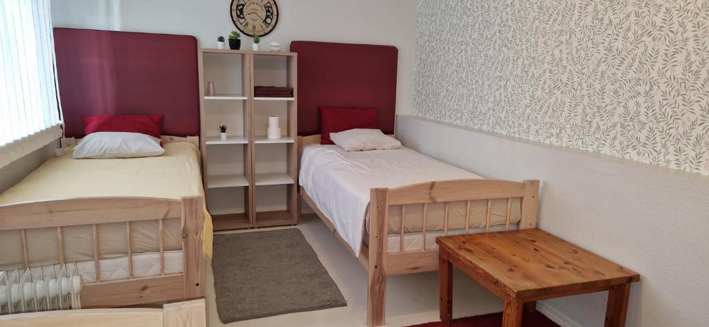 Postel nebo postele na pokoji v ubytování Freedom65 Hostel and Caravan