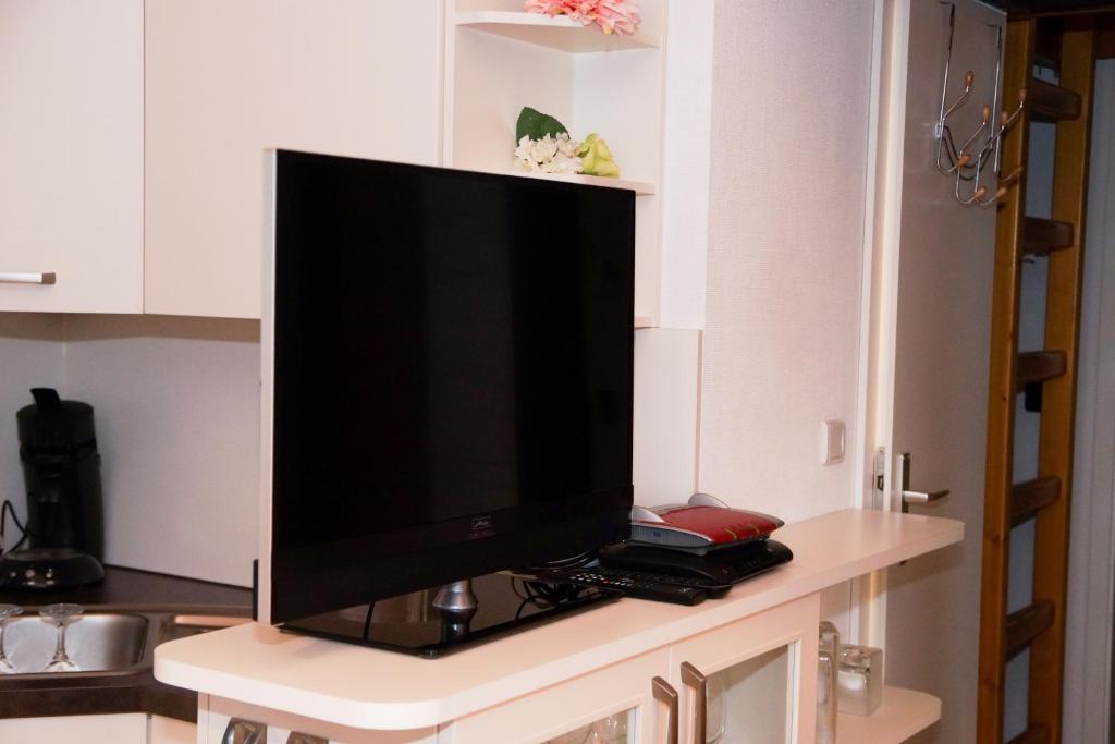 TV a/nebo společenská místnost v ubytování Henneglück mit Fernblick!