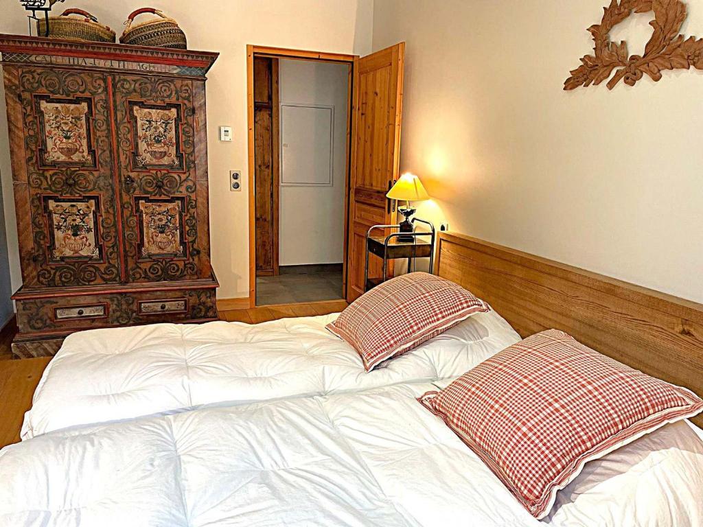 Posteľ alebo postele v izbe v ubytovaní Appartement 4 étoiles au cœur de Chamonix, 3 chambres, proche musée Alpin, parking, WiFi inclus - FR-1-343-186