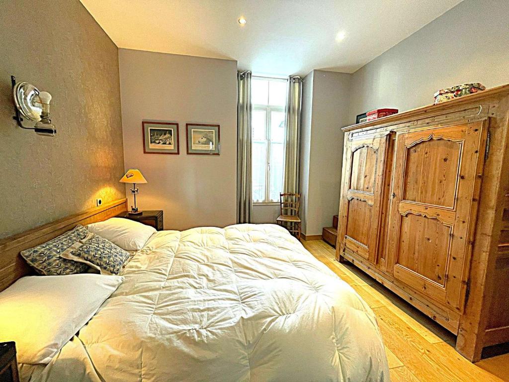 Posteľ alebo postele v izbe v ubytovaní Appartement 4 étoiles au cœur de Chamonix, 3 chambres, proche musée Alpin, parking, WiFi inclus - FR-1-343-186