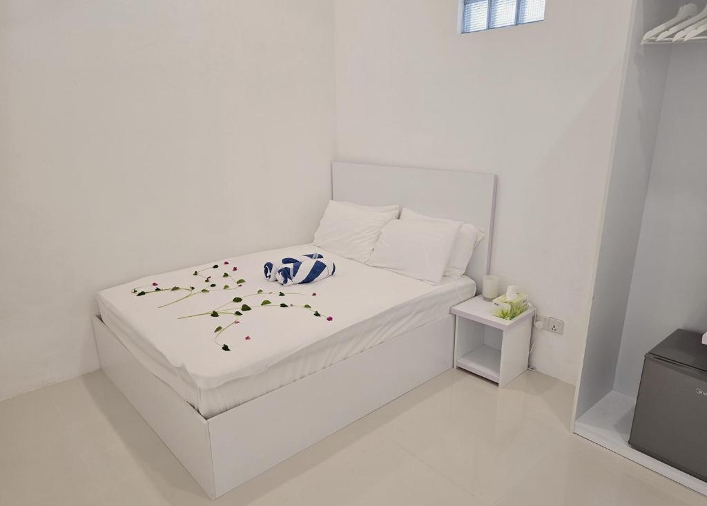 Postel nebo postele na pokoji v ubytování Casa De Himandhoo