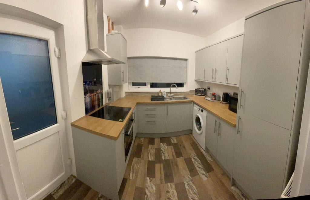 Kuchyň nebo kuchyňský kout v ubytování Seaside paradise