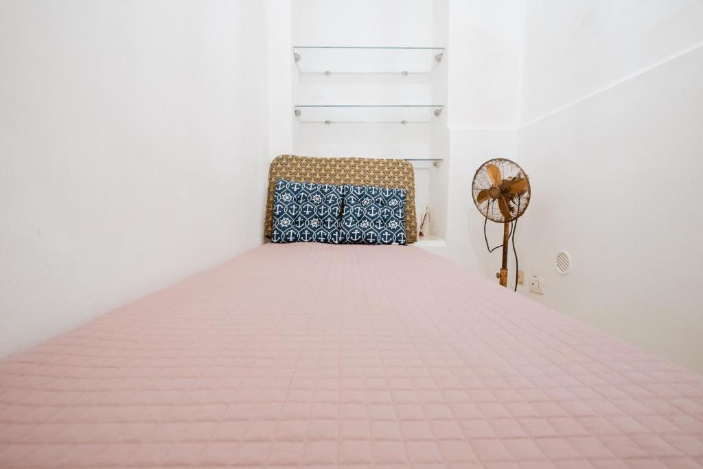 A bed or beds in a room at A 31 Passi dal Mare