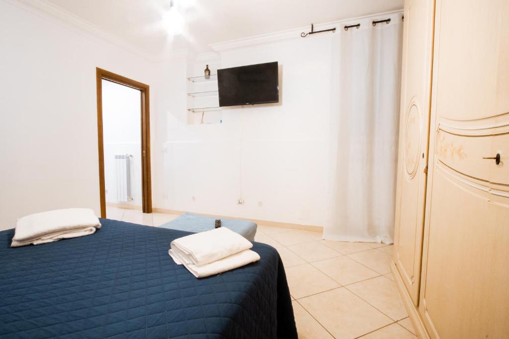 A bed or beds in a room at A 31 Passi dal Mare