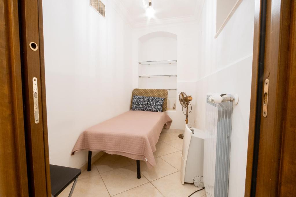 A bed or beds in a room at A 31 Passi dal Mare