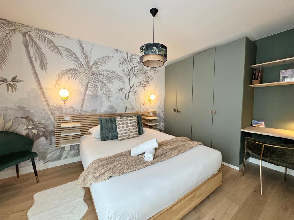 Ένα ή περισσότερα κρεβάτια σε δωμάτιο στο Le Petit Mail, Centre de Rennes