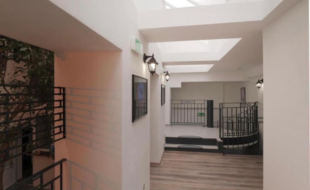 a hallway of a building with a skylight at Hostel Old Town in Bratislava