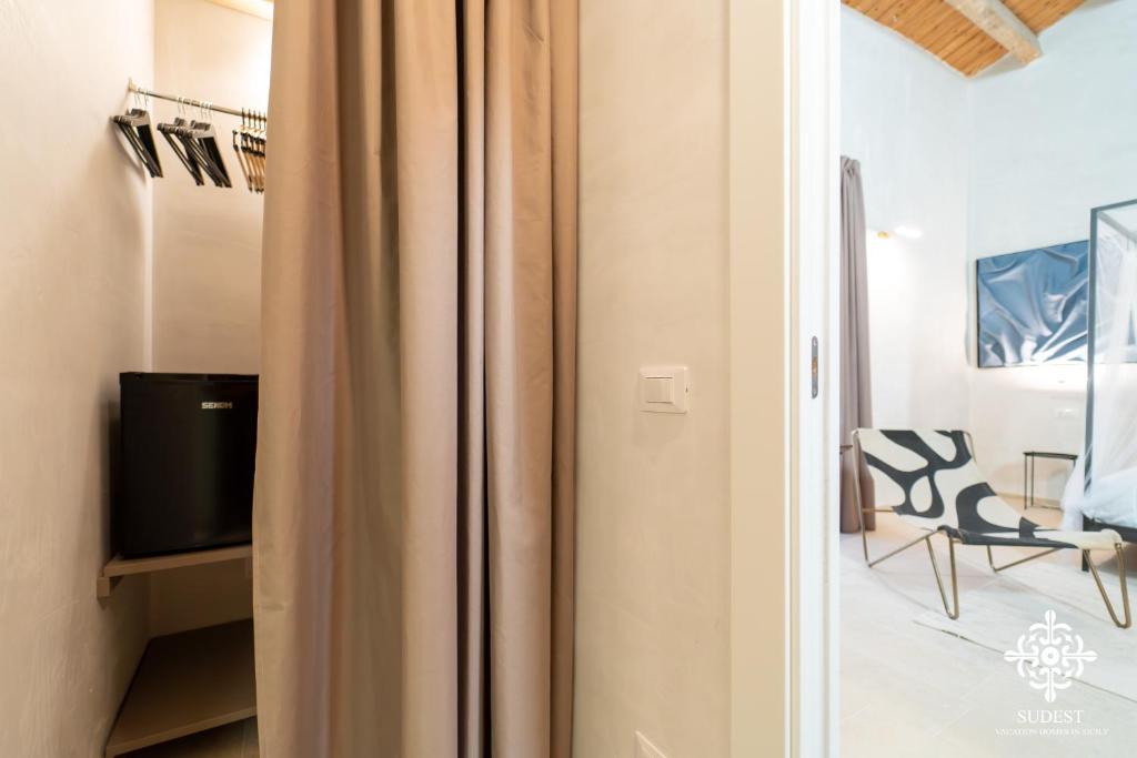 TV a/nebo společenská místnost v ubytování Casa Philomena - Noto Design Rooms