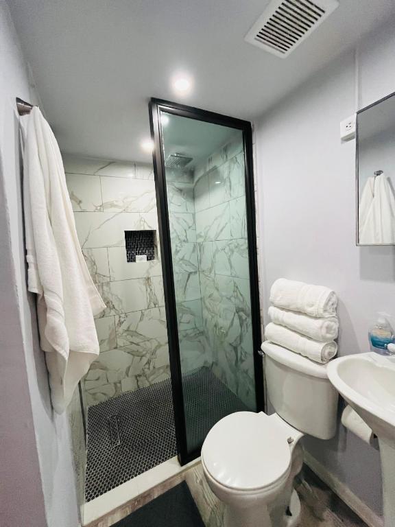 Koupelna v ubytování Hotel Libertad