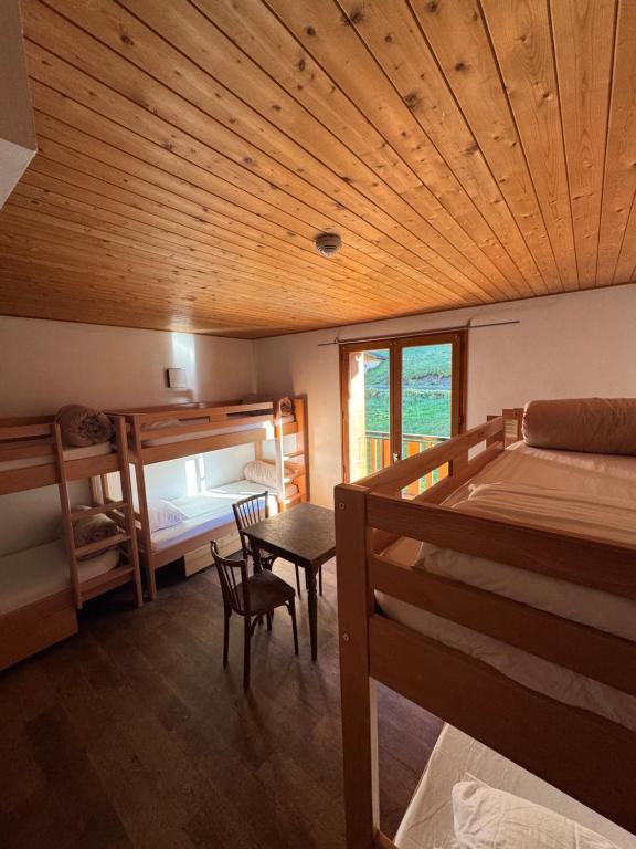 Postel nebo postele na pokoji v ubytování L'Ardesia