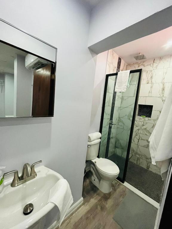 Koupelna v ubytování Hotel Libertad