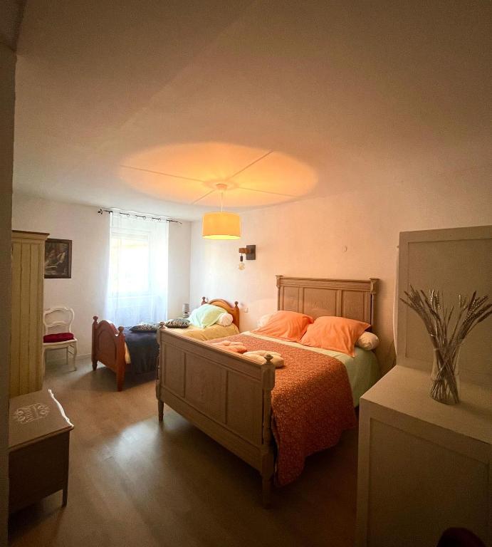 Posteľ alebo postele v izbe v ubytovaní Meublé 3 étoiles dans un petit village du Gers