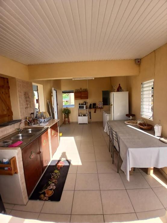 Kuchyň nebo kuchyňský kout v ubytování Au D LOCATION