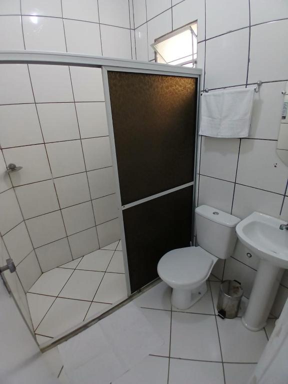 Koupelna v ubytování Hotel Aconchegante
