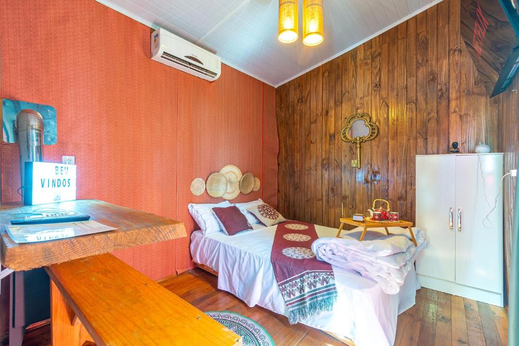 Posezení v ubytování Chalé com Hidromassagem Próximo ao Templo Budista