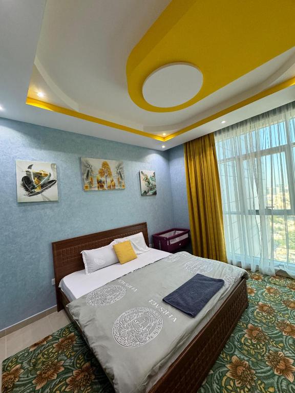 Voodi või voodid majutusasutuse Sunset Beach View Holiday Homes toas