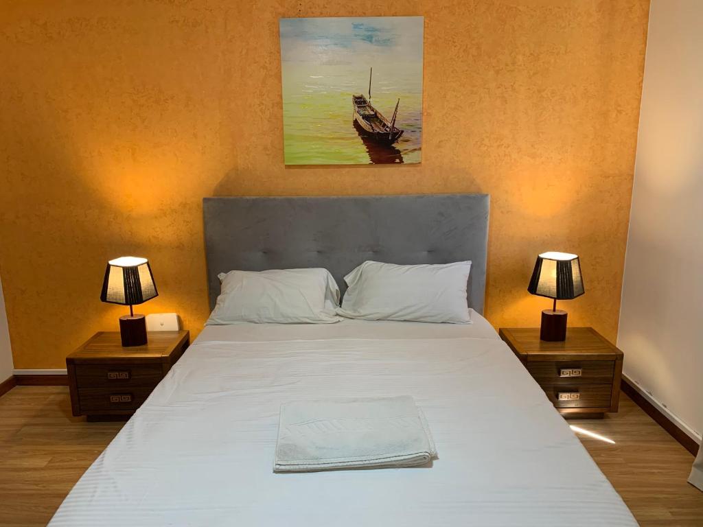Postel nebo postele na pokoji v ubytování AWA Cabo Verde