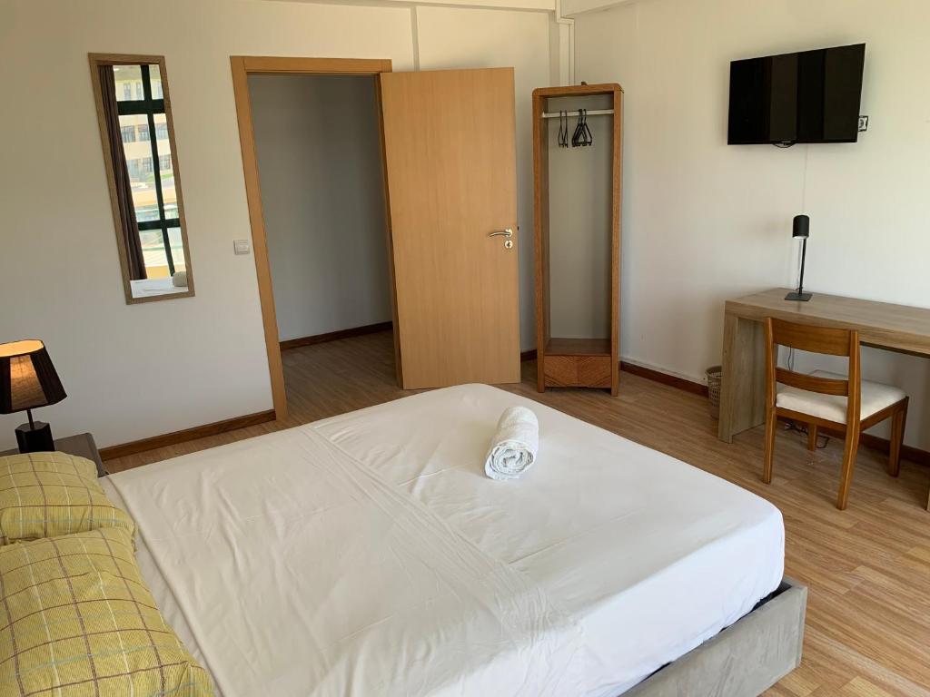 Postel nebo postele na pokoji v ubytování AWA Cabo Verde