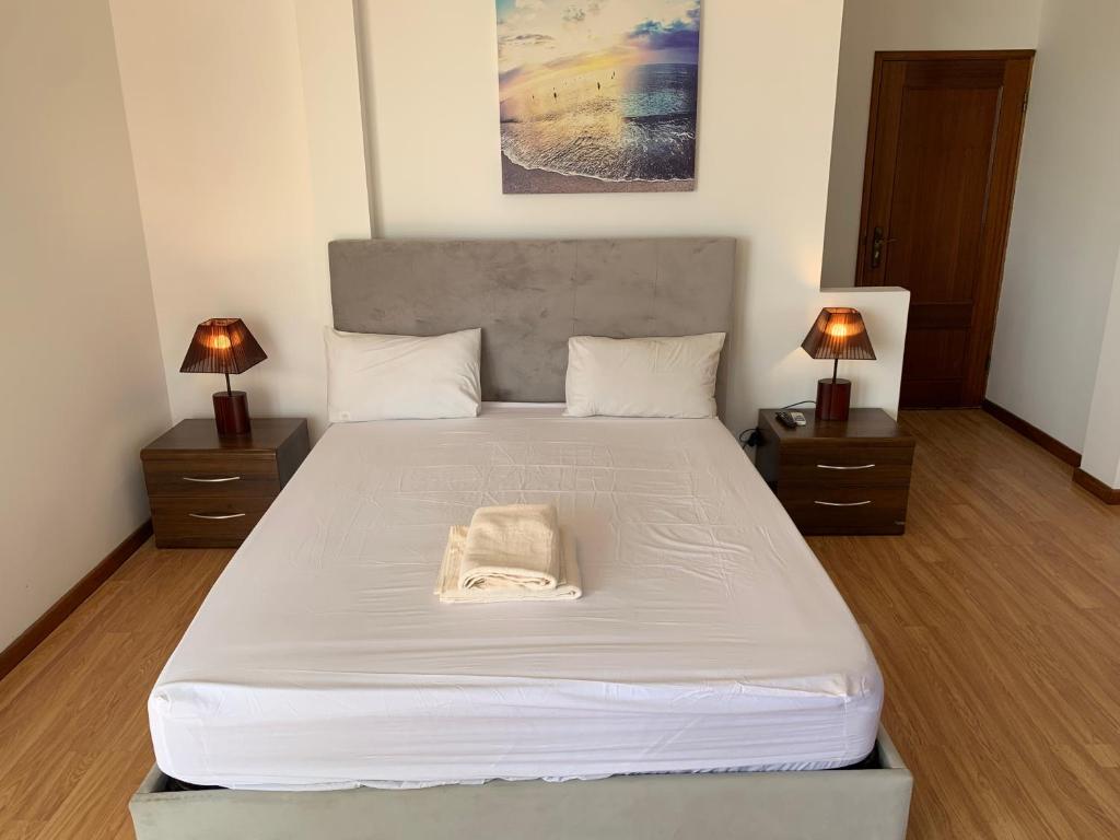 Postel nebo postele na pokoji v ubytování AWA Cabo Verde