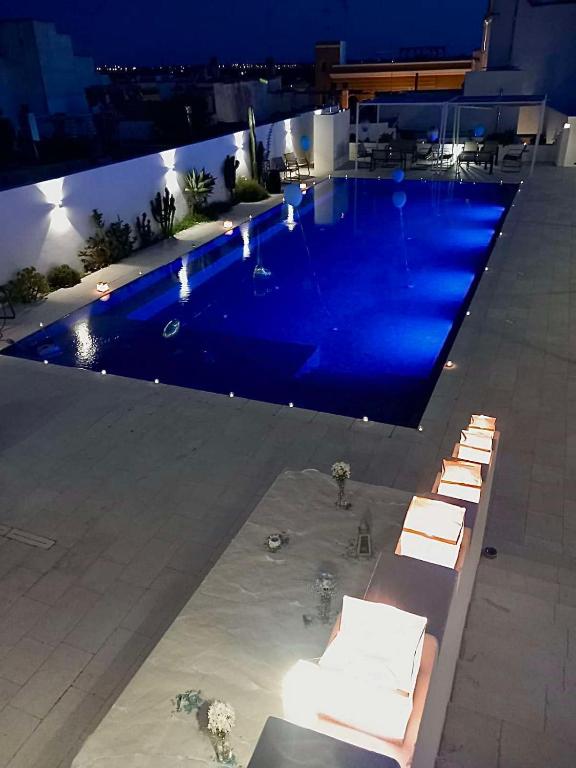 The swimming pool at or close to Appartamento Magnolia Deluxe