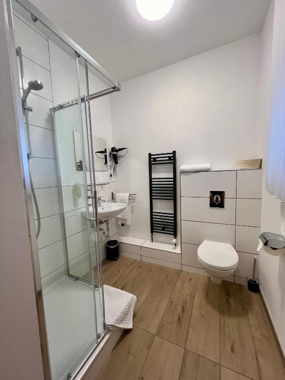 Koupelna v ubytování Hotel Residenz Stockstadt