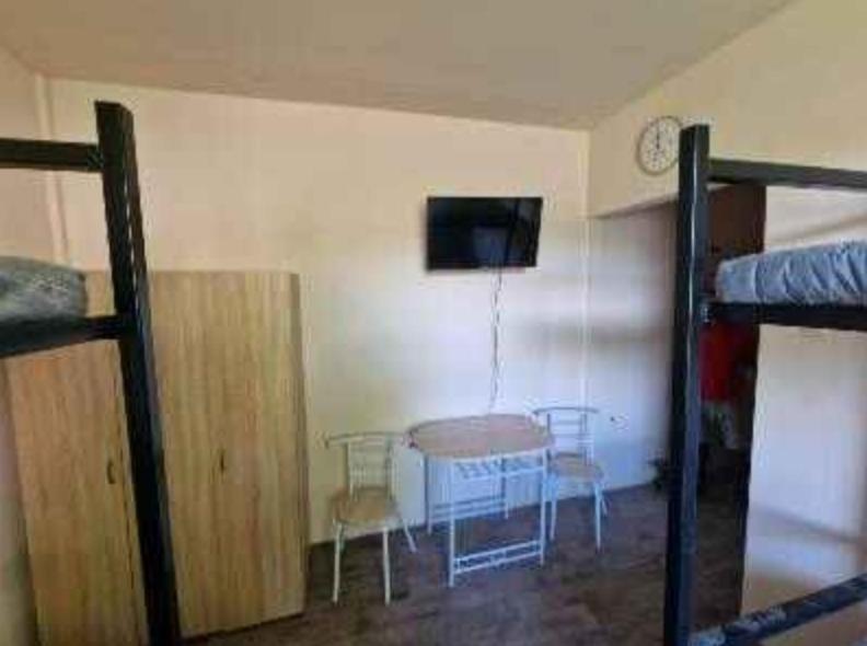 Postel nebo postele na pokoji v ubytování SB Szálló