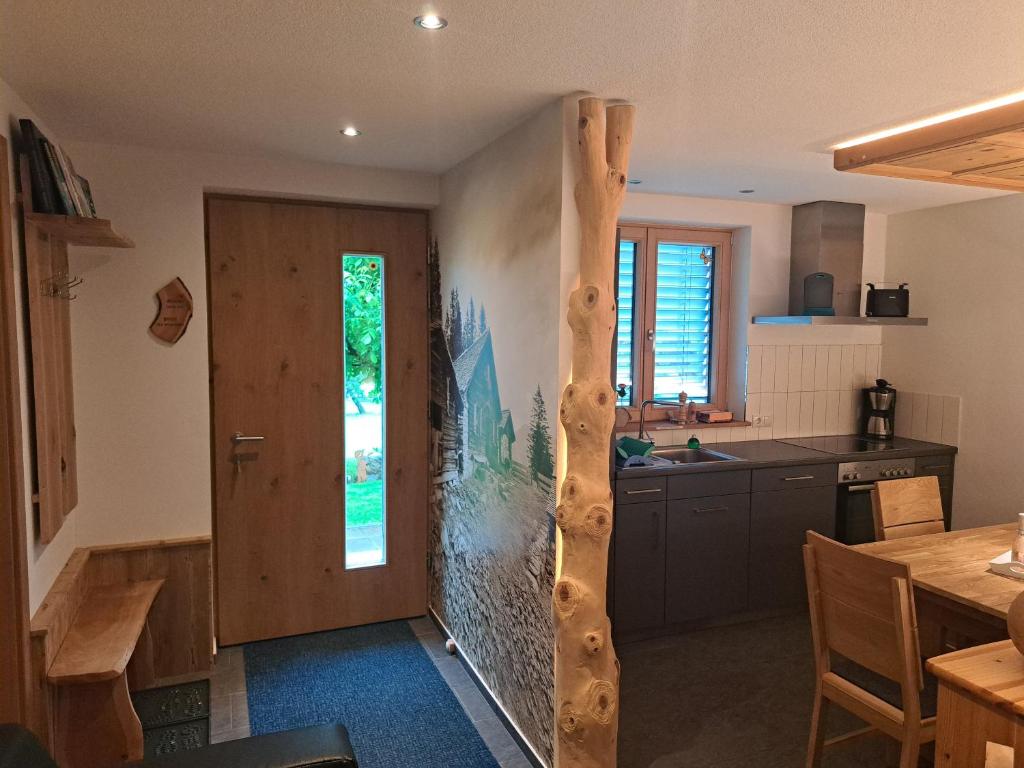 Kuchyň nebo kuchyňský kout v ubytování Haus Carmen, Familienfreundliche 4 Edelweiss Ferienwohnung mit TOP Einrichtung
