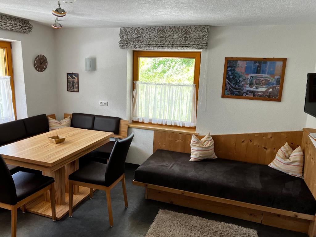 A seating area at Haus Steissbach